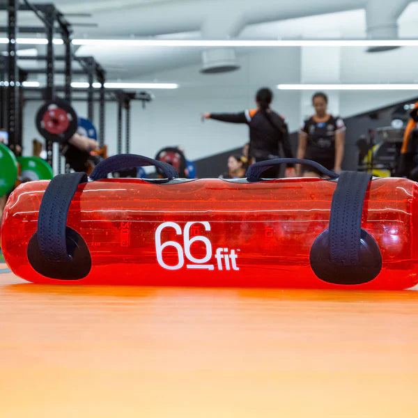 66fit Flux Power Bag sitting in a gym setting.